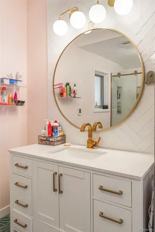 a living room with furniture and large windows