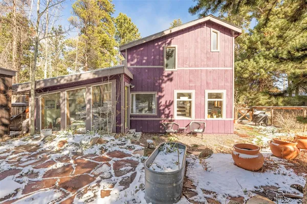 a view of a yard with a tree