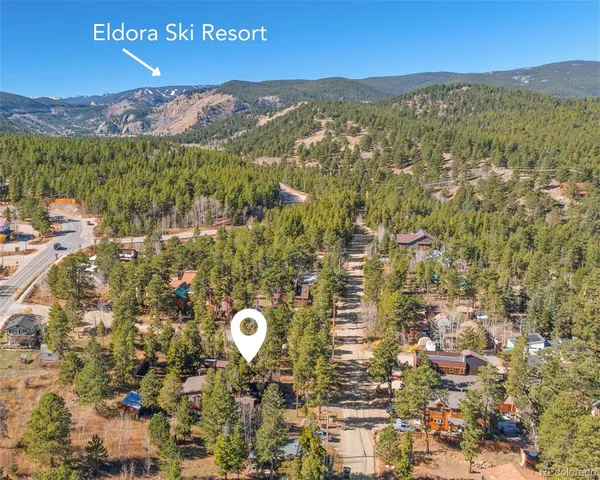 an aerial view of residential building with parking space