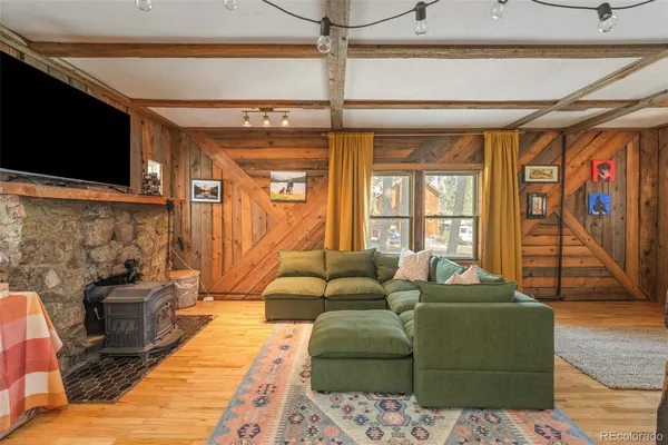 a view of a kitchen with a sink and a stove top oven