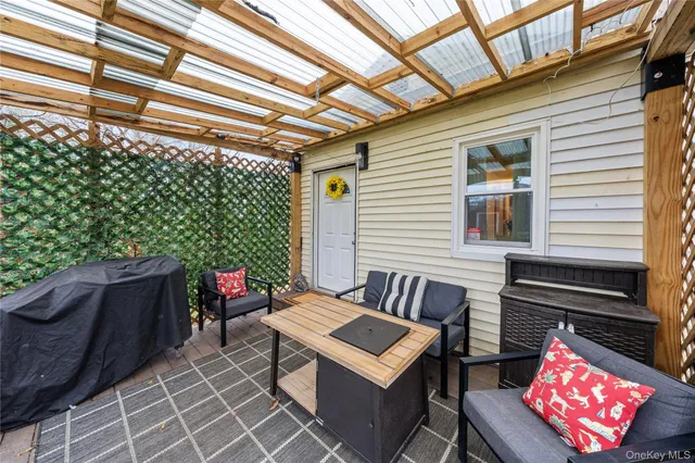 a view of a field of grass and trees