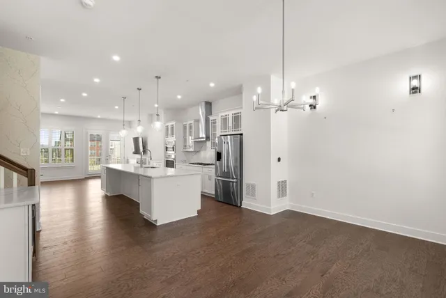 a bathroom with a sink a mirror and a toilet