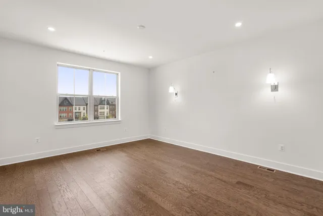 a bathroom with double sink and a mirror
