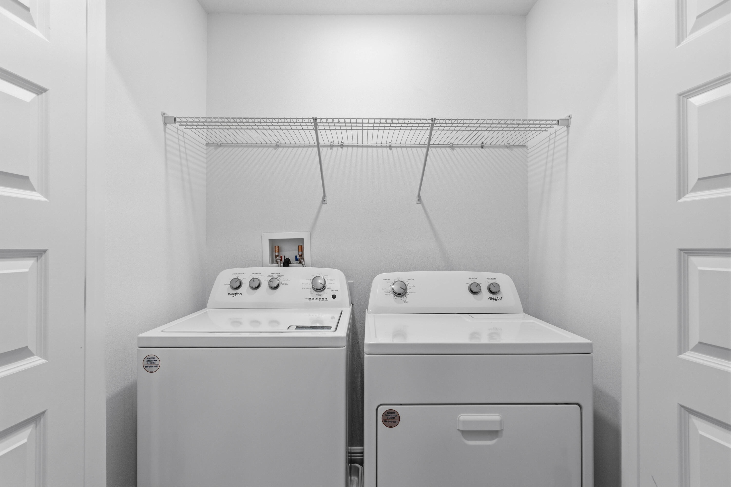 7 Renea Cove Destin, FL 32541 - Photo 25 of 36 a utility room with dryer and washer