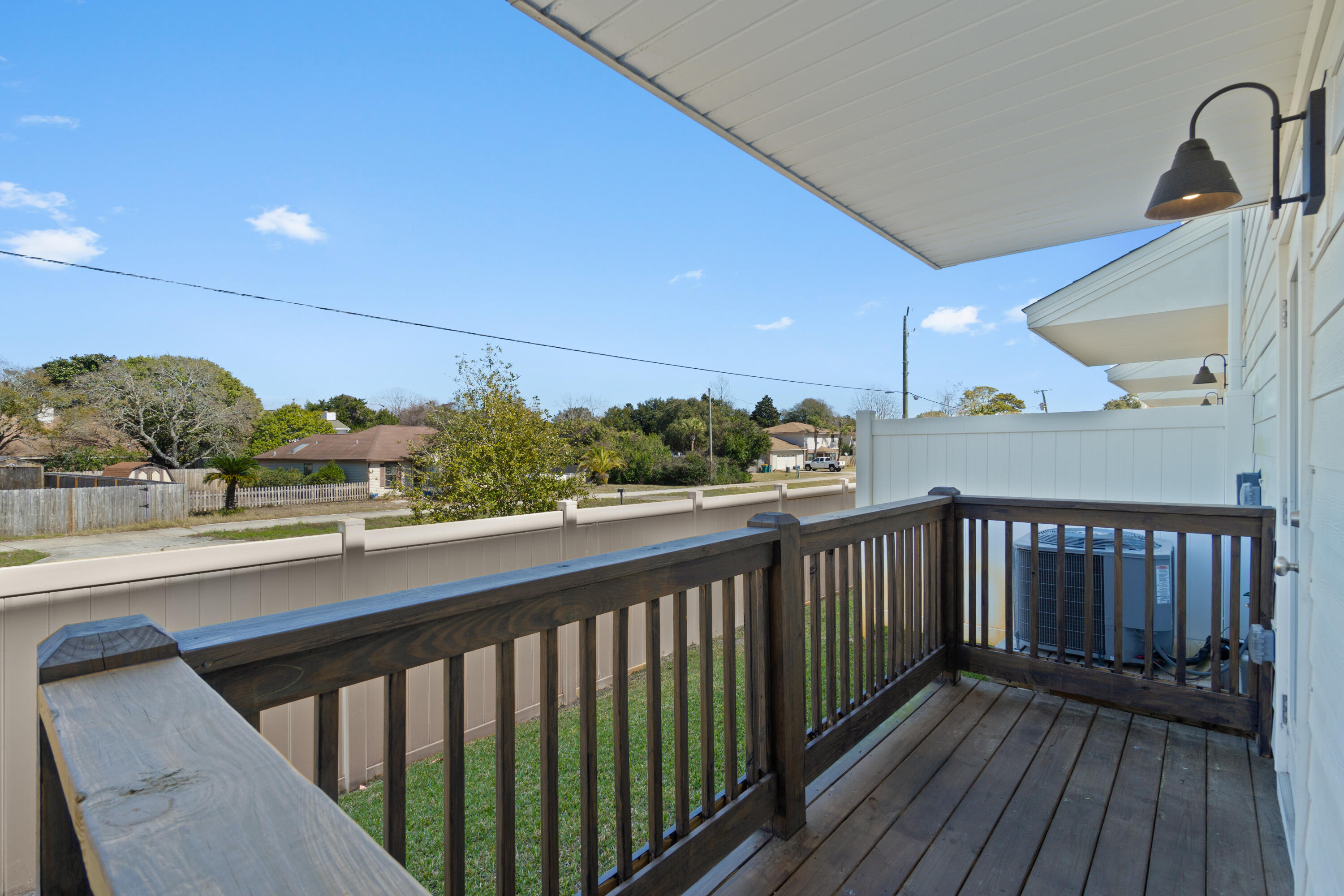 7 Renea Cove Destin, FL 32541 - Photo 26 of 36 a view of balcony with wooden floor