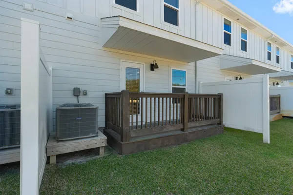 a view of a porch with a yard