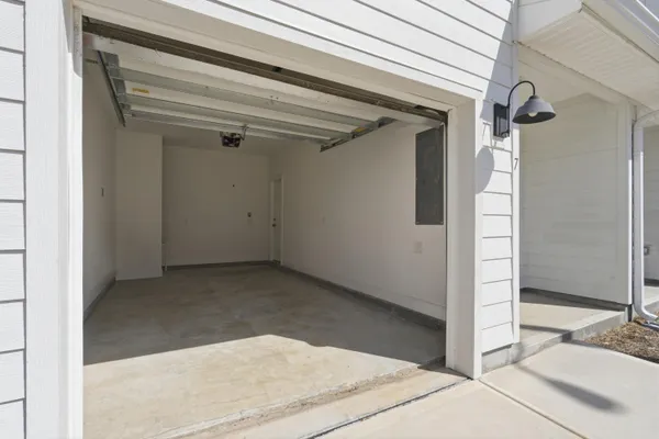 a view of a hallway with closet and entryway