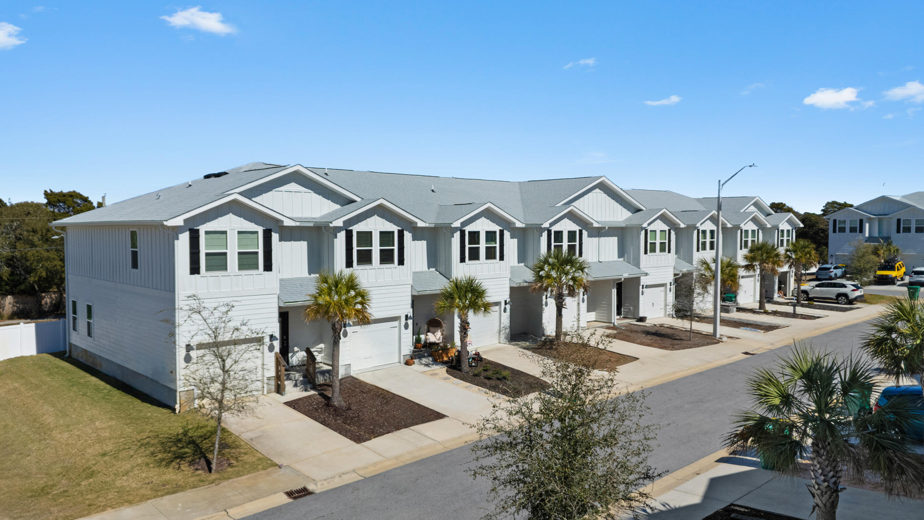 7 Renea Cove Destin, FL 32541 - Photo 29 of 36 a front view of a residential houses with yard and mountain view