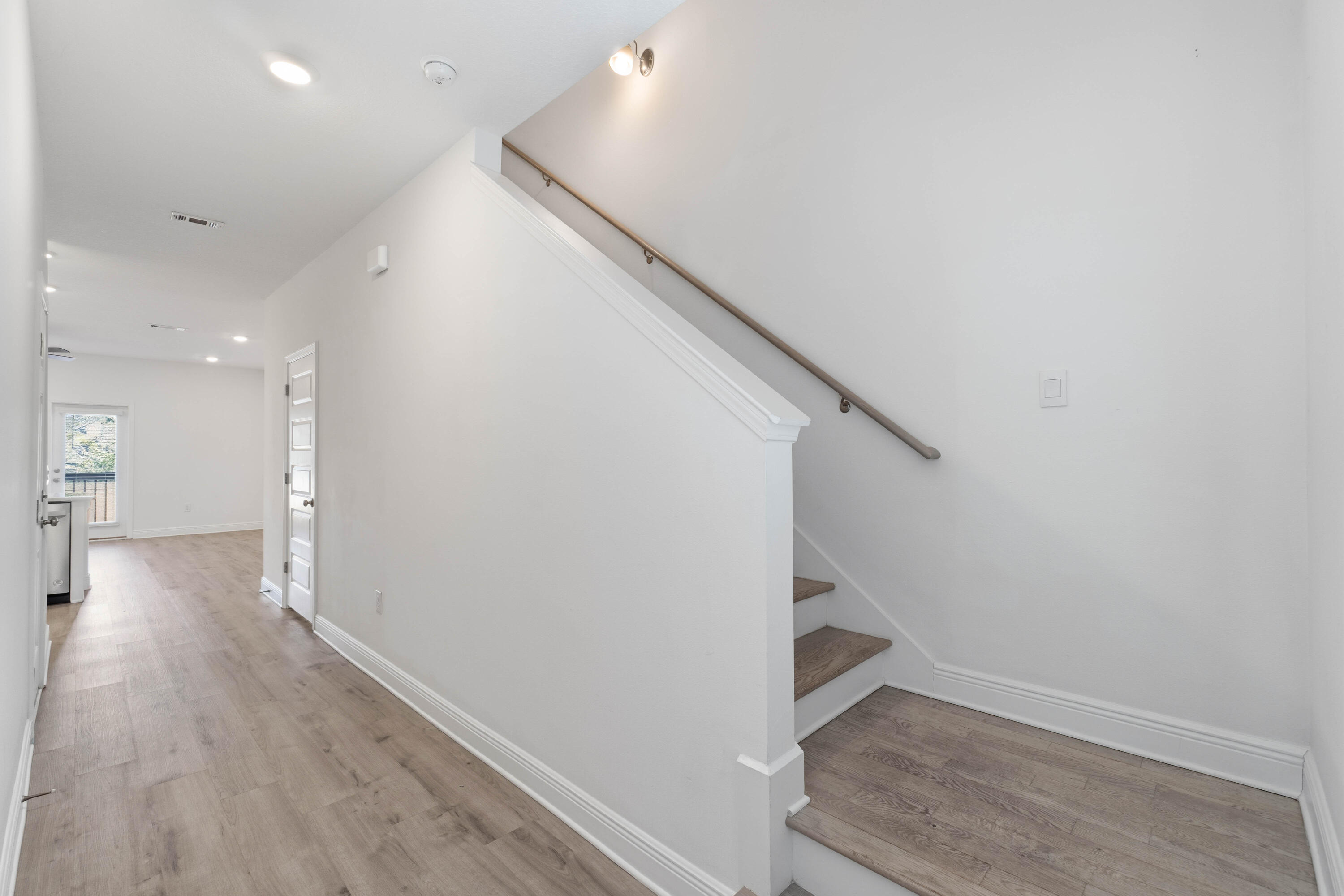 7 Renea Cove Destin, FL 32541 - Photo 5 of 36 a view of an entryway with wooden floor