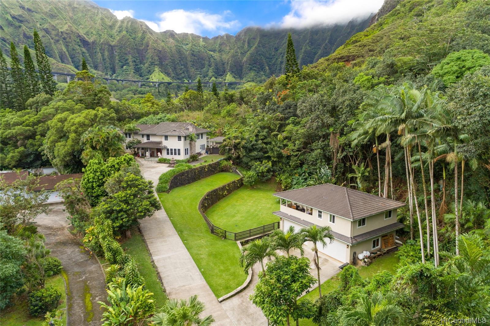 Incredible tropical retreat at the foot of the Koolau Mountains. This property features two structures on a terraced 1.7 acre lot.