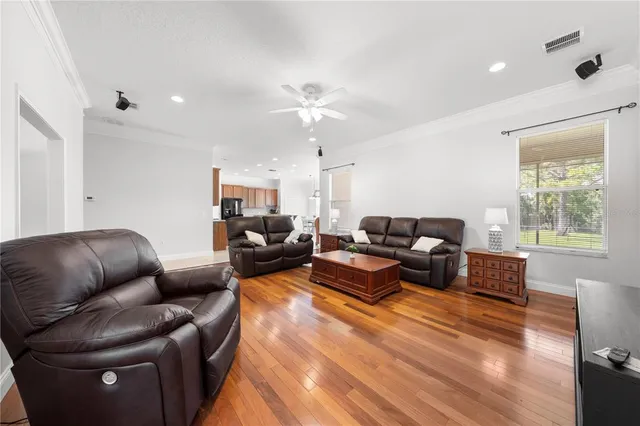 a kitchen with a stove sink and cabinets