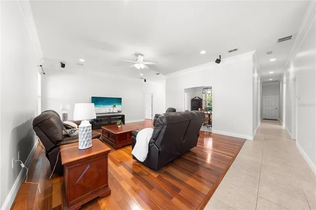 a kitchen with stainless steel appliances granite countertop a sink a stove top oven a counter space and cabinets