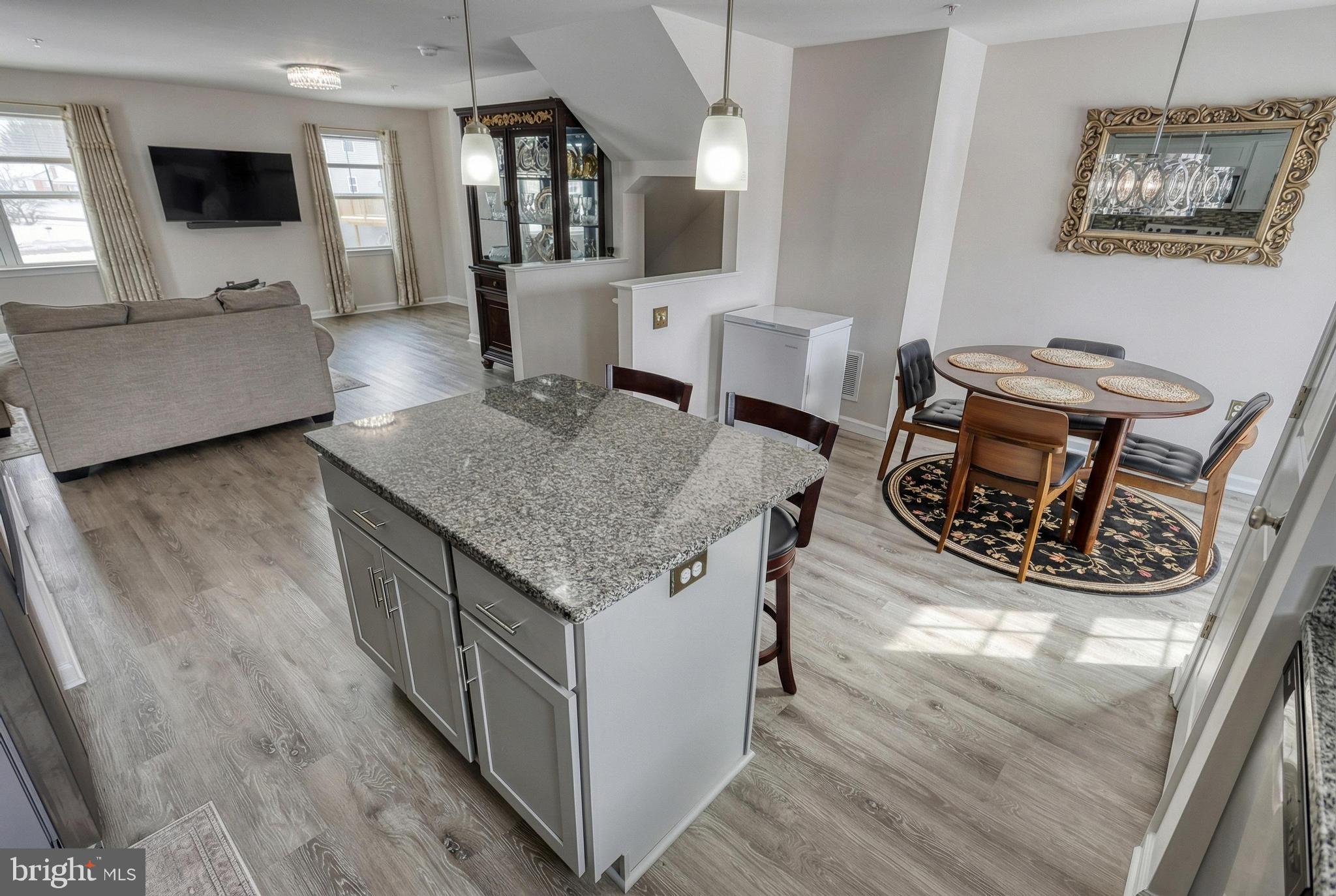 1 Landing Place, Unit 1 York, PA 17408 - Photo 16 of 48 a view of kitchen island with granite countertop living room
