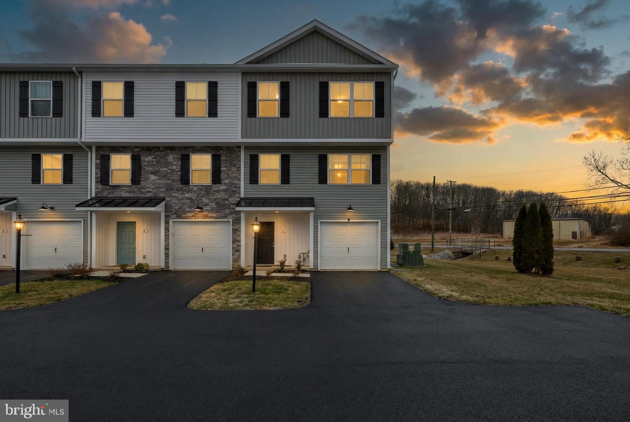 1 Landing Place, Unit 1 York, PA 17408 - Photo 2 of 48 a front view of a house with a yard