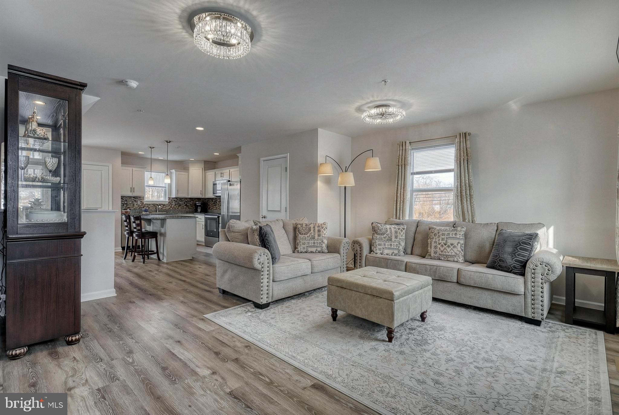 1 Landing Place, Unit 1 York, PA 17408 - Photo 23 of 48 a living room with furniture and a large window