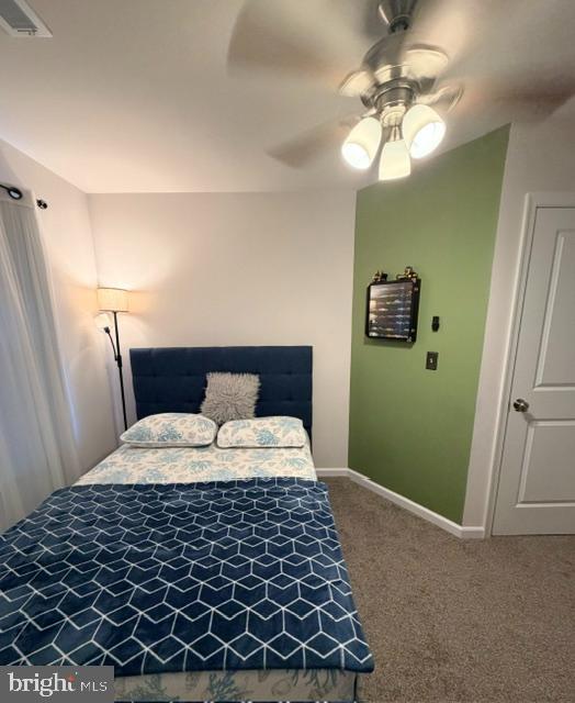 1 Landing Place, Unit 1 York, PA 17408 - Photo 39 of 48 a bedroom with a large bed and a chandelier