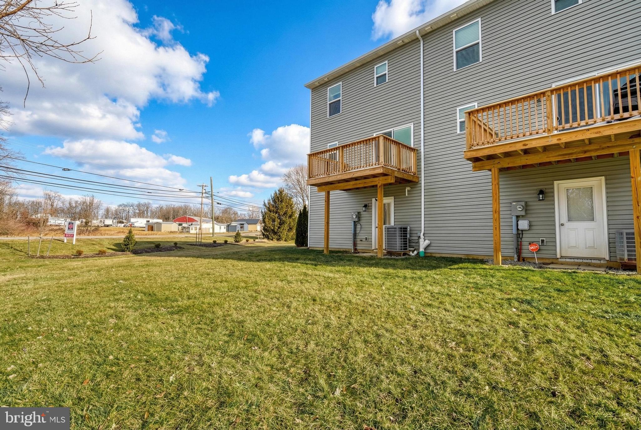 1 Landing Place, Unit 1 York, PA 17408 - Photo 48 of 48 a front view of a house with a yard