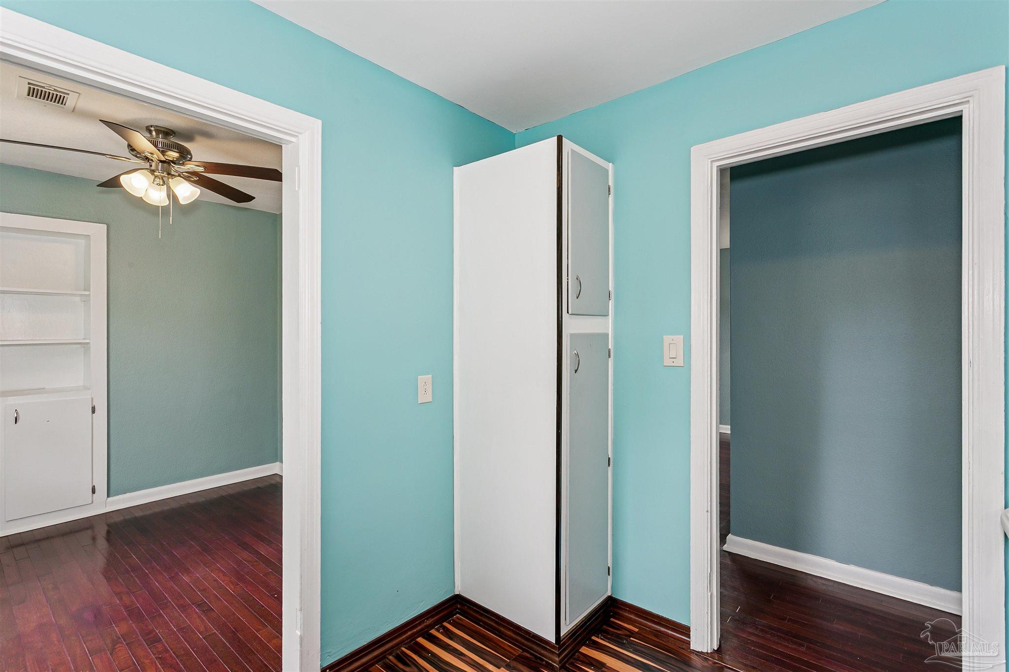 100 Milton Road Pensacola, FL 32507 - Photo 12 of 28 a view of a hallway with wooden floor