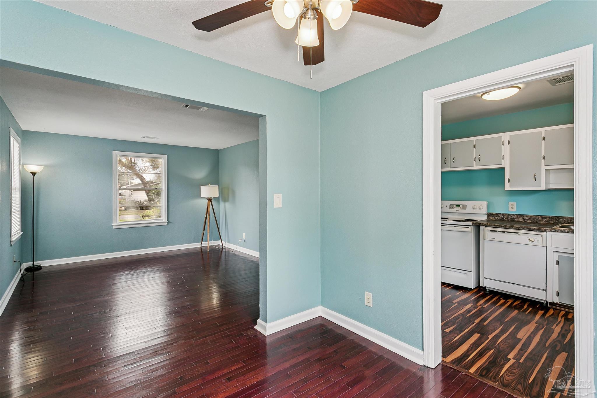 100 Milton Road Pensacola, FL 32507 - Photo 15 of 28 a view of an empty room with window and wooden floor