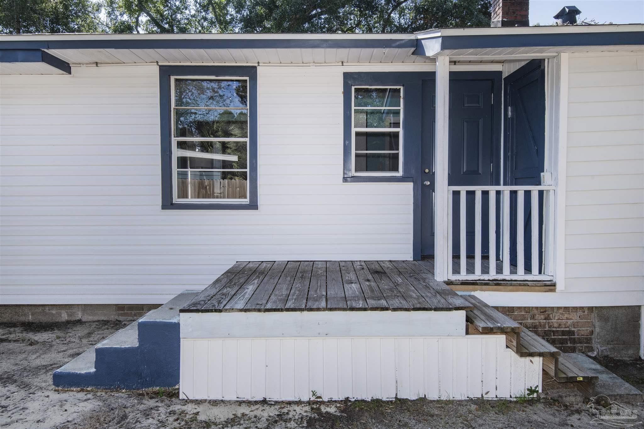 100 Milton Road Pensacola, FL 32507 - Photo 27 of 28 a front view of a house