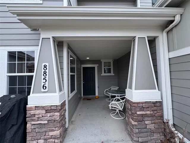 a view of front door and furniture