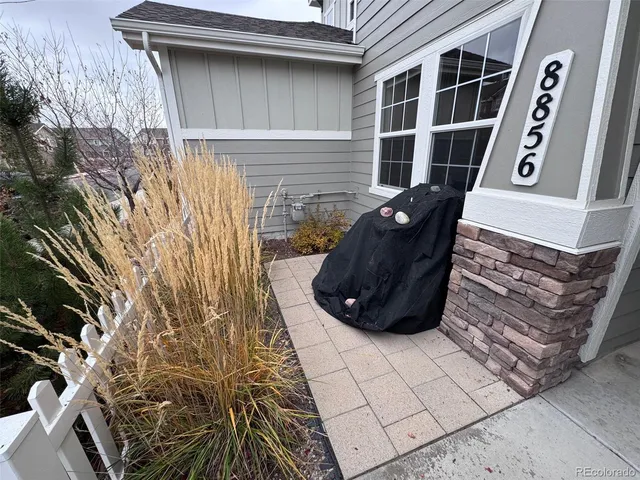 a view of a lounge chair in front of a building