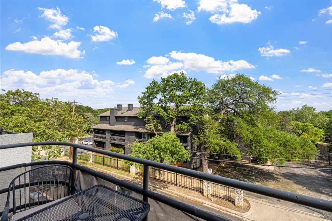 2605 Enfield Road, Unit 209 Austin, TX 78703 - Photo 26 of 29 a view of a balcony with an outdoor space