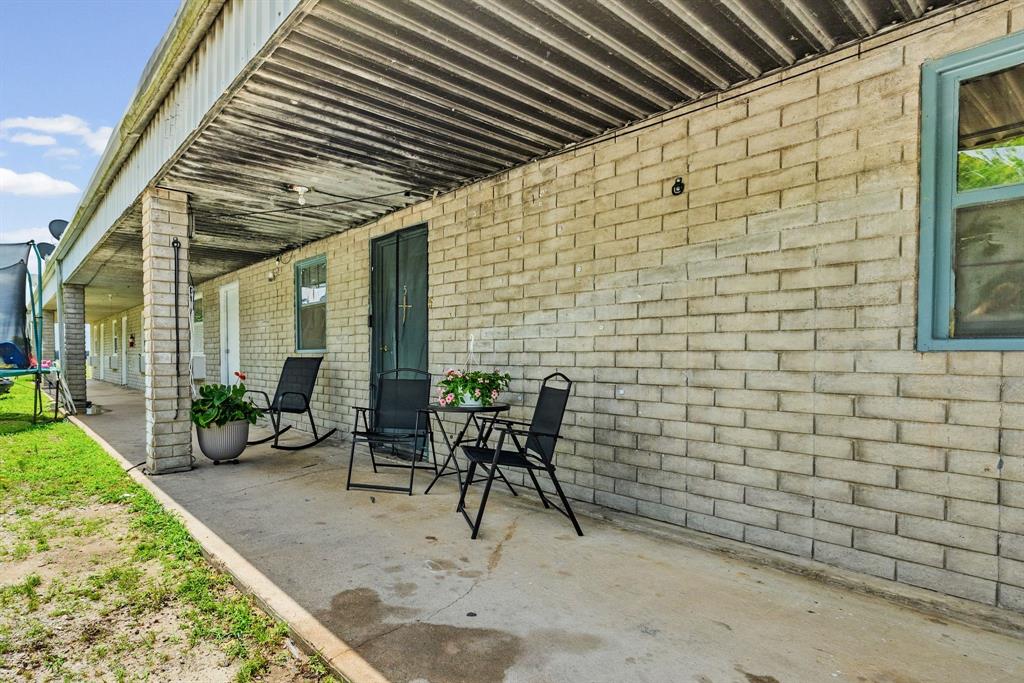 4509 Diamond D Road Lone Oak, TX 75453 - Photo 35 of 36 a patio with table and chairs