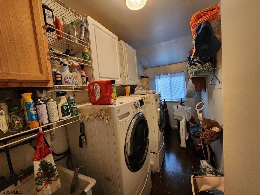 63 Cranford Road Turnersville, NJ 08012 - Photo 12 of 35 a view of a storage and utility room with washer and dryer