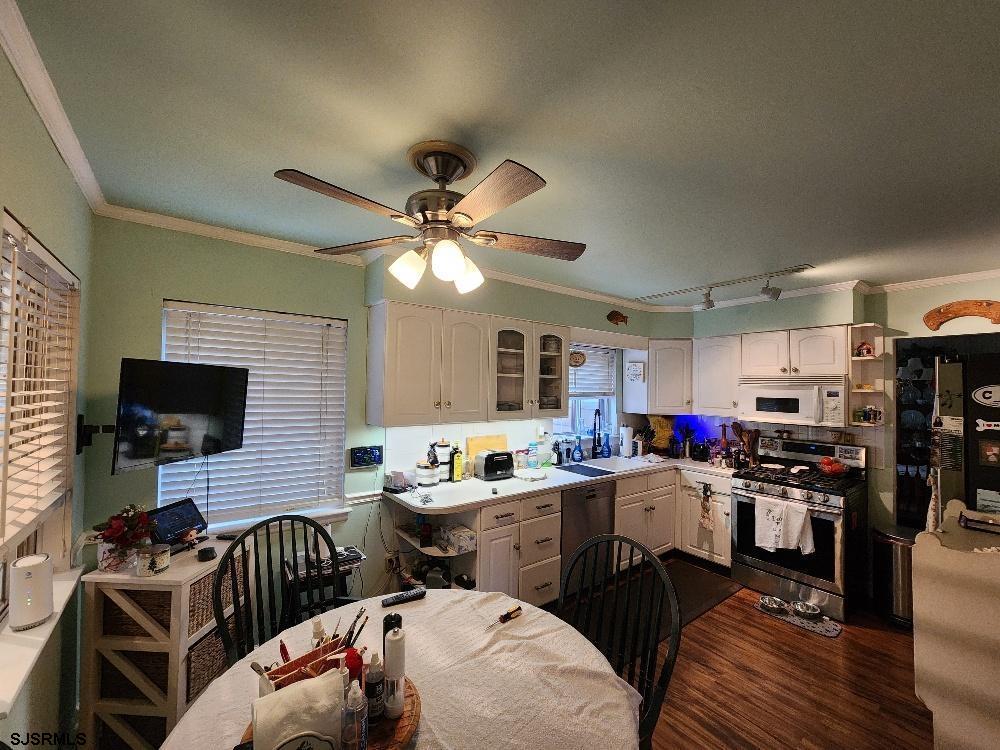 63 Cranford Road Turnersville, NJ 08012 - Photo 16 of 35 a kitchen that has a sink and a stove top oven