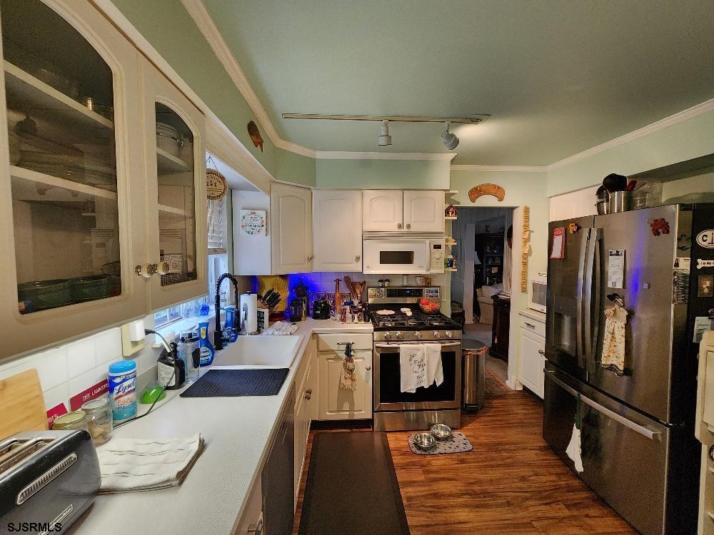 63 Cranford Road Turnersville, NJ 08012 - Photo 18 of 35 a kitchen with stainless steel appliances a stove a refrigerator and a refrigerator