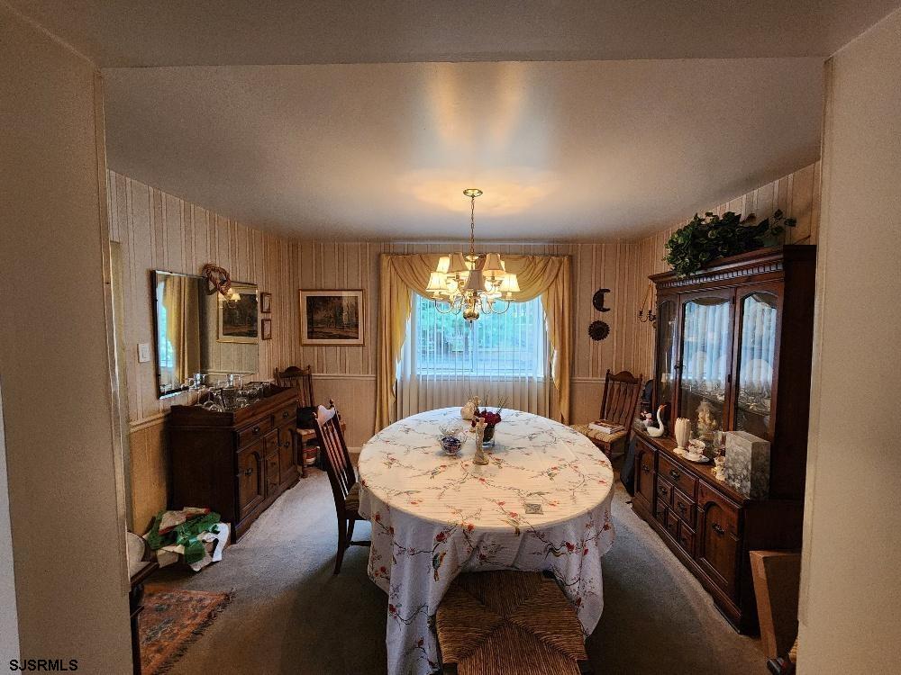 63 Cranford Road Turnersville, NJ 08012 - Photo 19 of 35 a view of a dining room with furniture and window