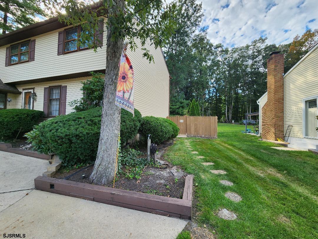 63 Cranford Road Turnersville, NJ 08012 - Photo 2 of 35 a front view of a house with a yard and garage