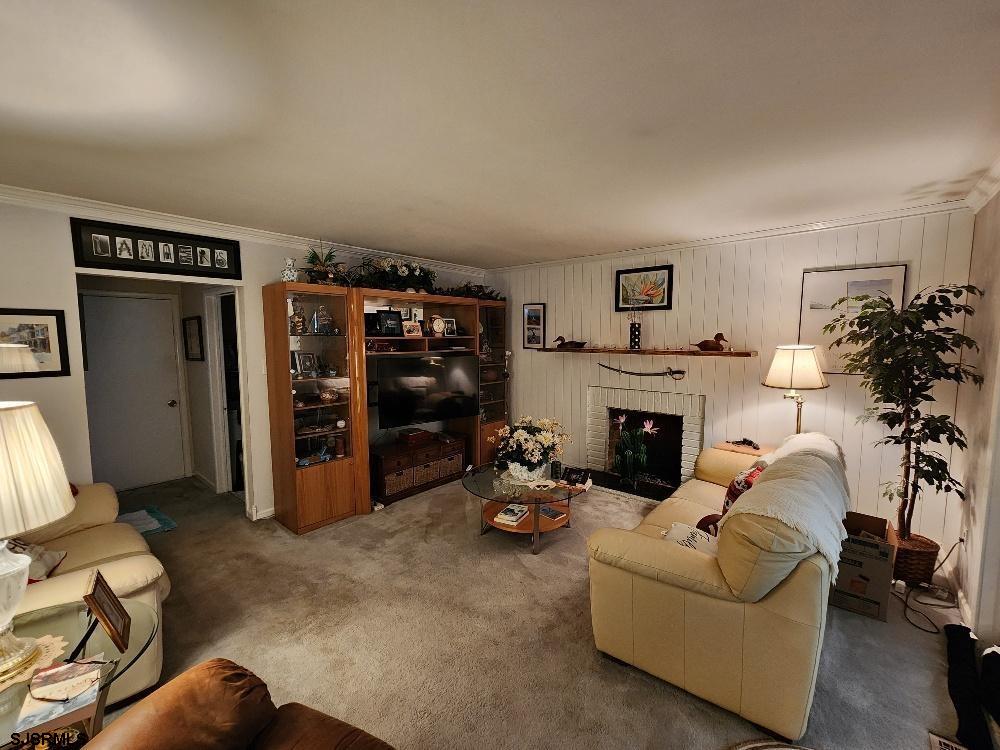63 Cranford Road Turnersville, NJ 08012 - Photo 21 of 35 a living room with furniture and a fireplace
