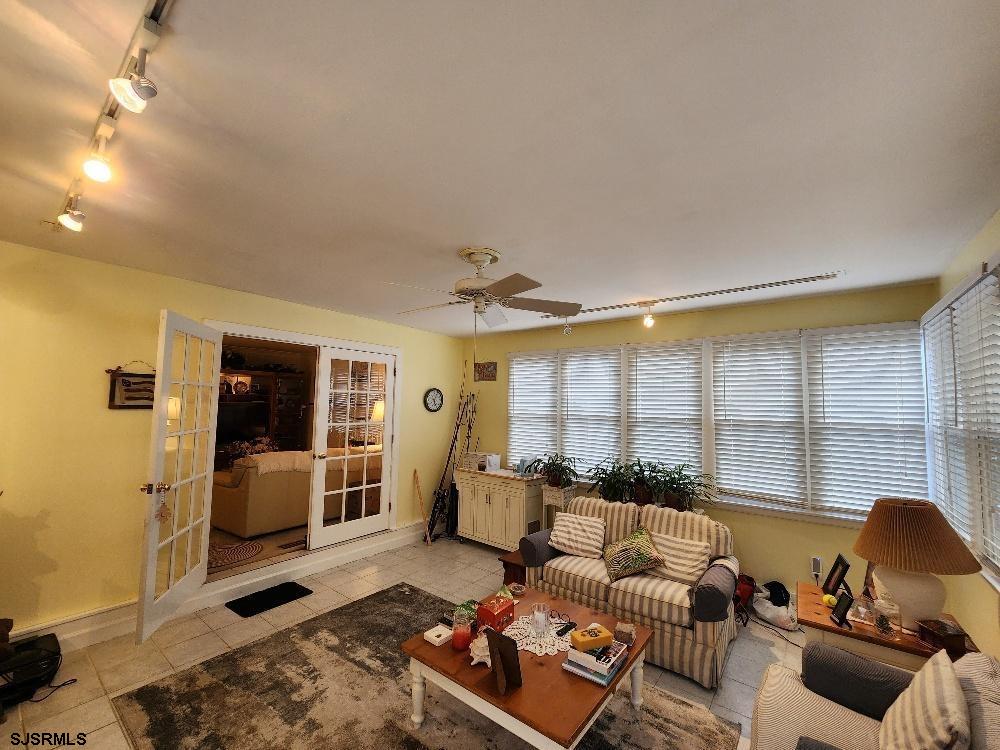 63 Cranford Road Turnersville, NJ 08012 - Photo 23 of 35 a living room with furniture and large windows