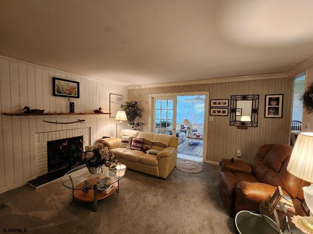 63 Cranford Road Turnersville, NJ 08012 - Photo 25 of 35 a living room with furniture and a fireplace