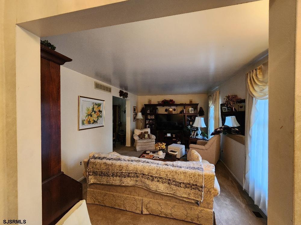 63 Cranford Road Turnersville, NJ 08012 - Photo 26 of 35 a living room with furniture and a flat screen tv