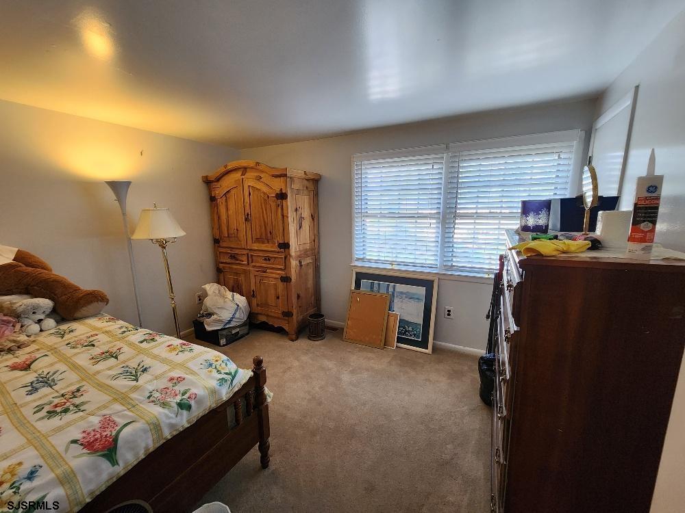 63 Cranford Road Turnersville, NJ 08012 - Photo 28 of 35 a bedroom with bed and a window