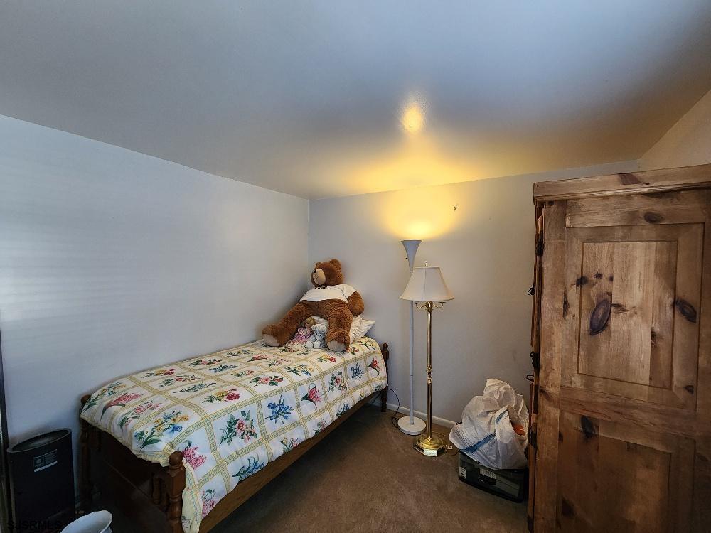 63 Cranford Road Turnersville, NJ 08012 - Photo 30 of 35 a bedroom with a bed and a window