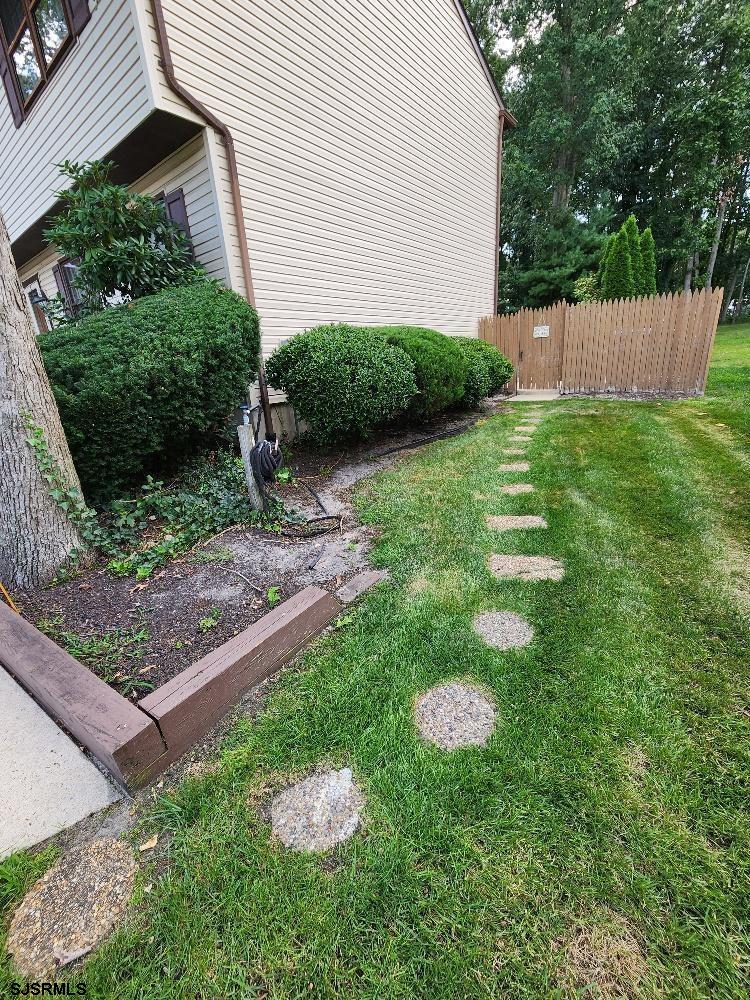 63 Cranford Road Turnersville, NJ 08012 - Photo 3 of 35 a view of a backyard with plants and large tree