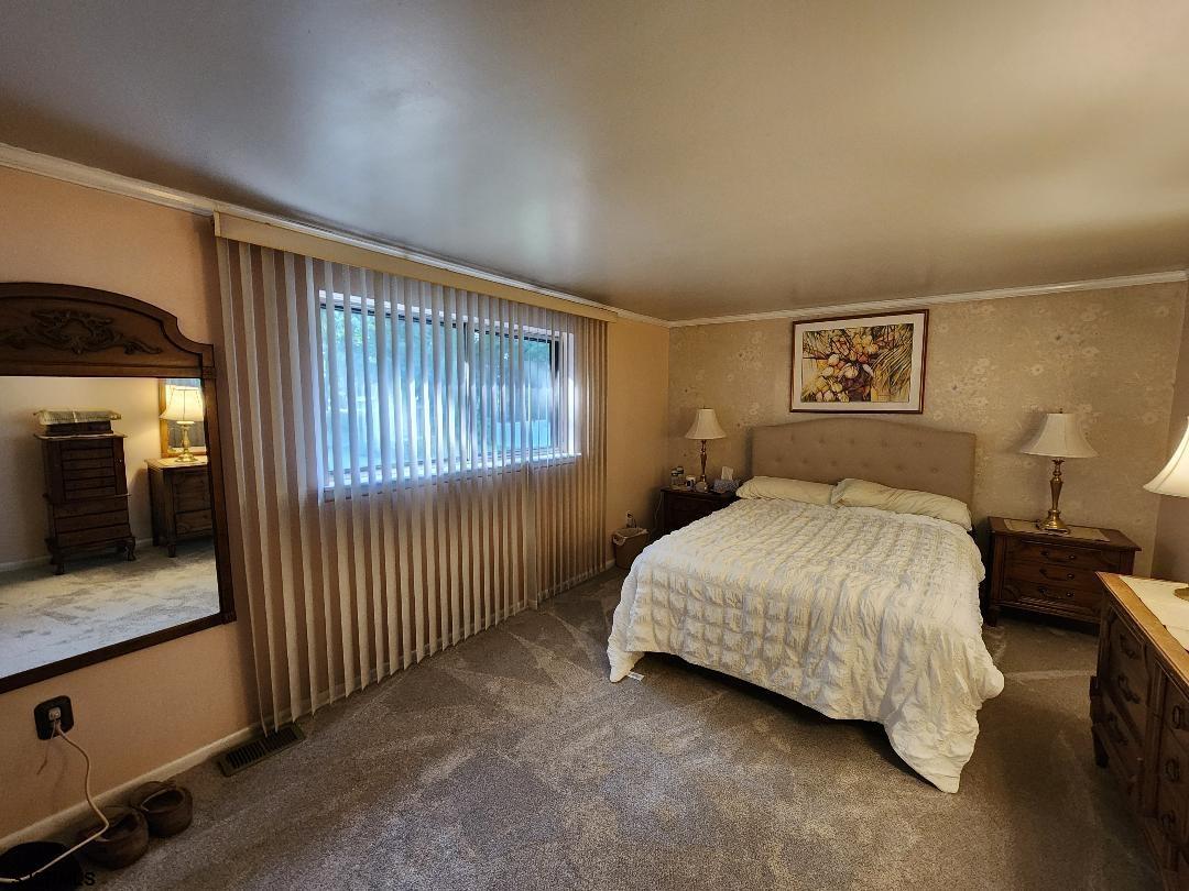 63 Cranford Road Turnersville, NJ 08012 - Photo 31 of 35 a bedroom with a bed and dresser