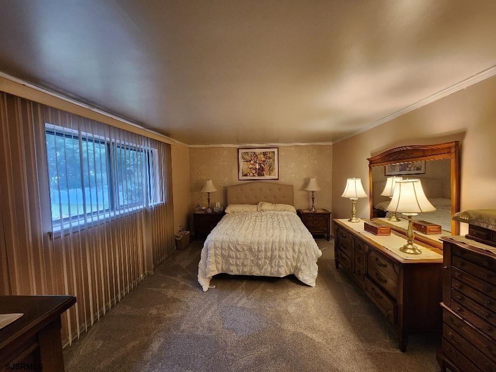 63 Cranford Road Turnersville, NJ 08012 - Photo 35 of 35 a bed room with a bed and a window