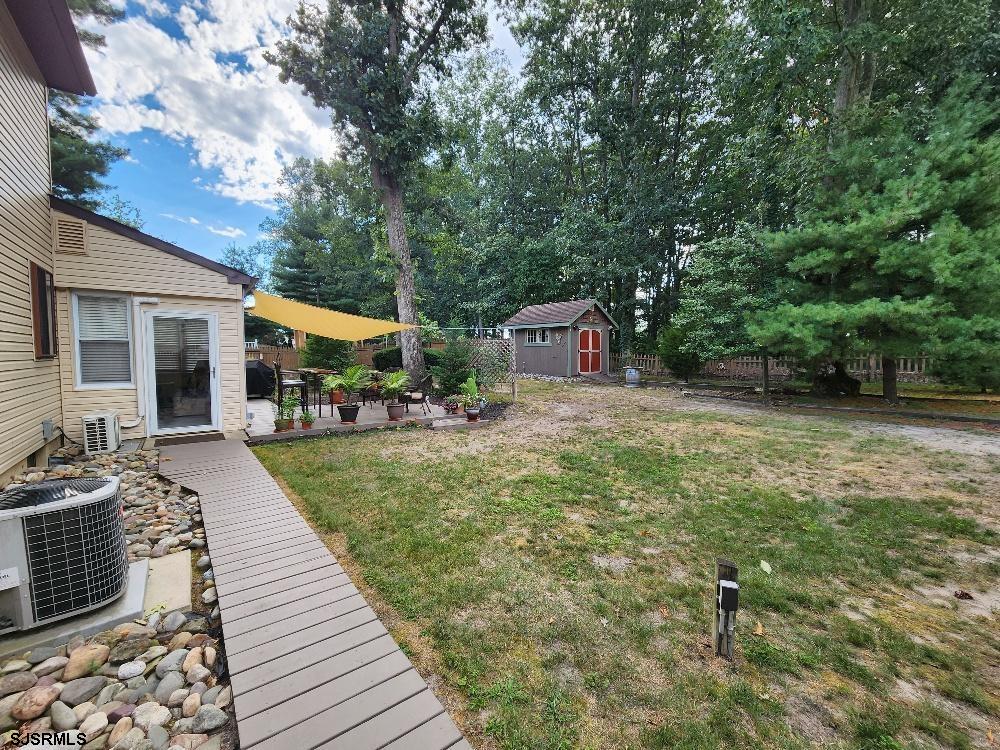 63 Cranford Road Turnersville, NJ 08012 - Photo 9 of 35 a view of a house with backyard porch and sitting area