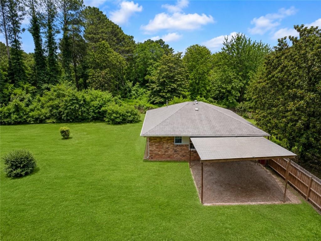 1189 Rock Cut Road Forest Park, GA 30297 - Photo 21 of 23 a aerial view of a house with garden