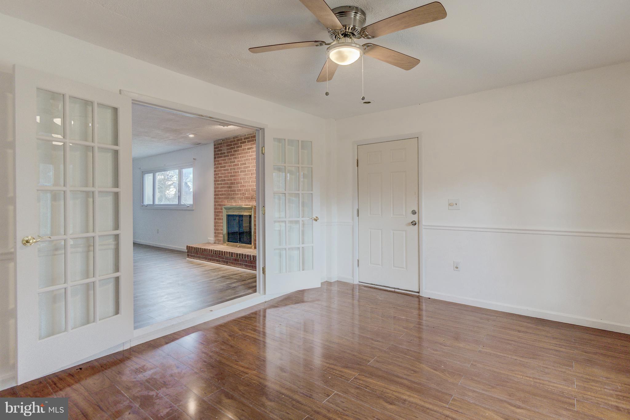 7105 Chamberlain Road Windsor Mill, MD 21244 - Photo 19 of 38 Large bonus rm off of family rm w/ french doors