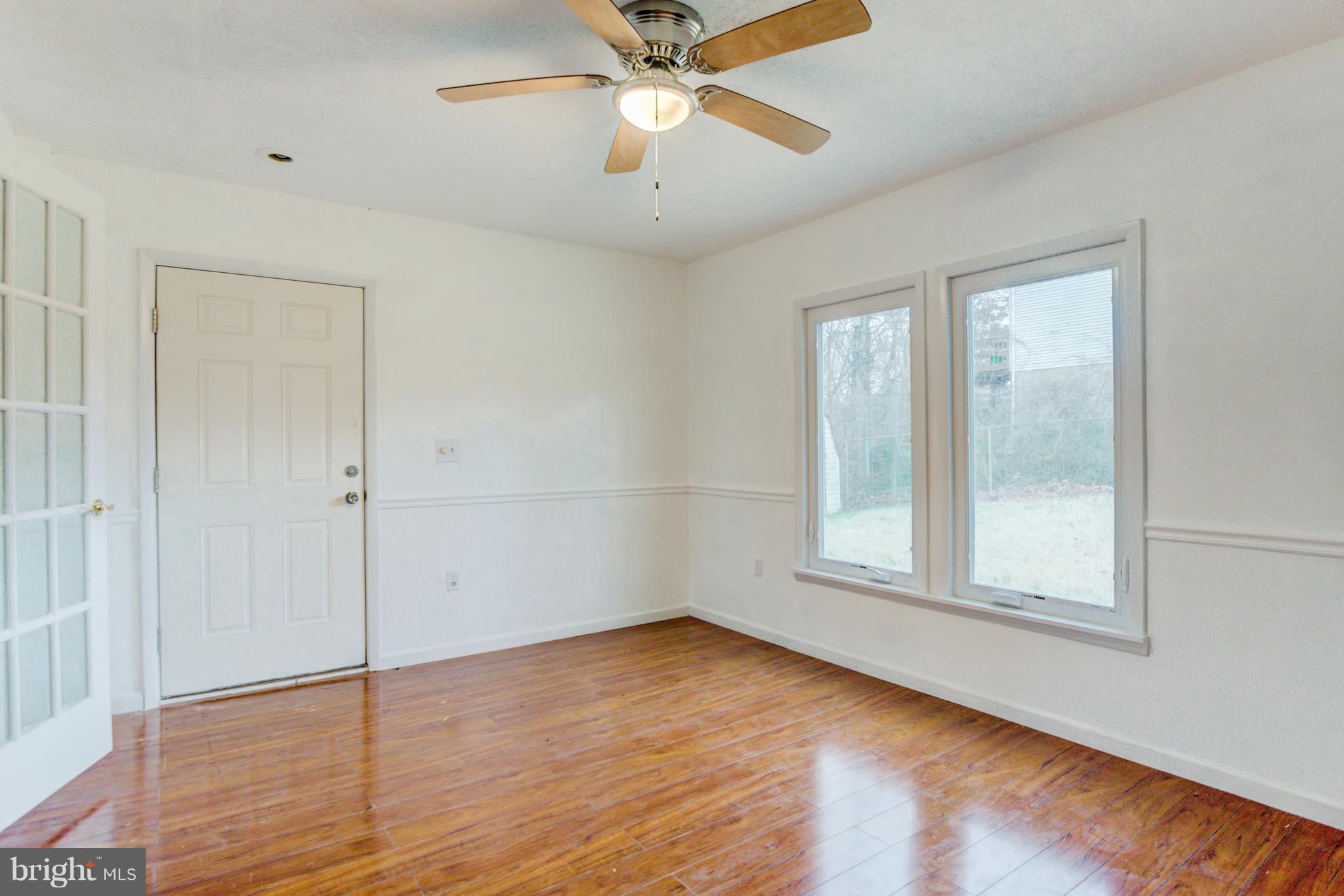 7105 Chamberlain Road Windsor Mill, MD 21244 - Photo 20 of 38 Lots of light and a ceiling fan
