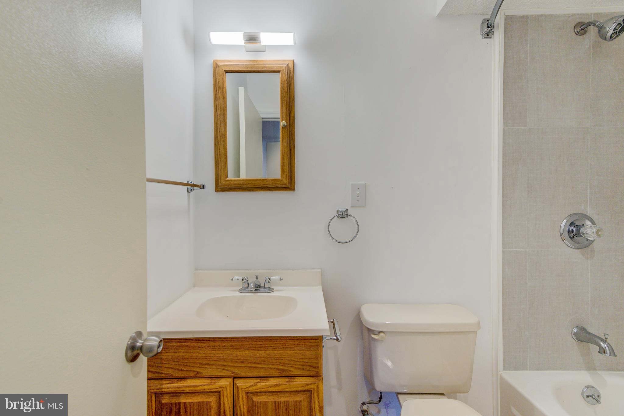 7105 Chamberlain Road Windsor Mill, MD 21244 - Photo 33 of 38 HALL BATH - FULL BATH ... NEW