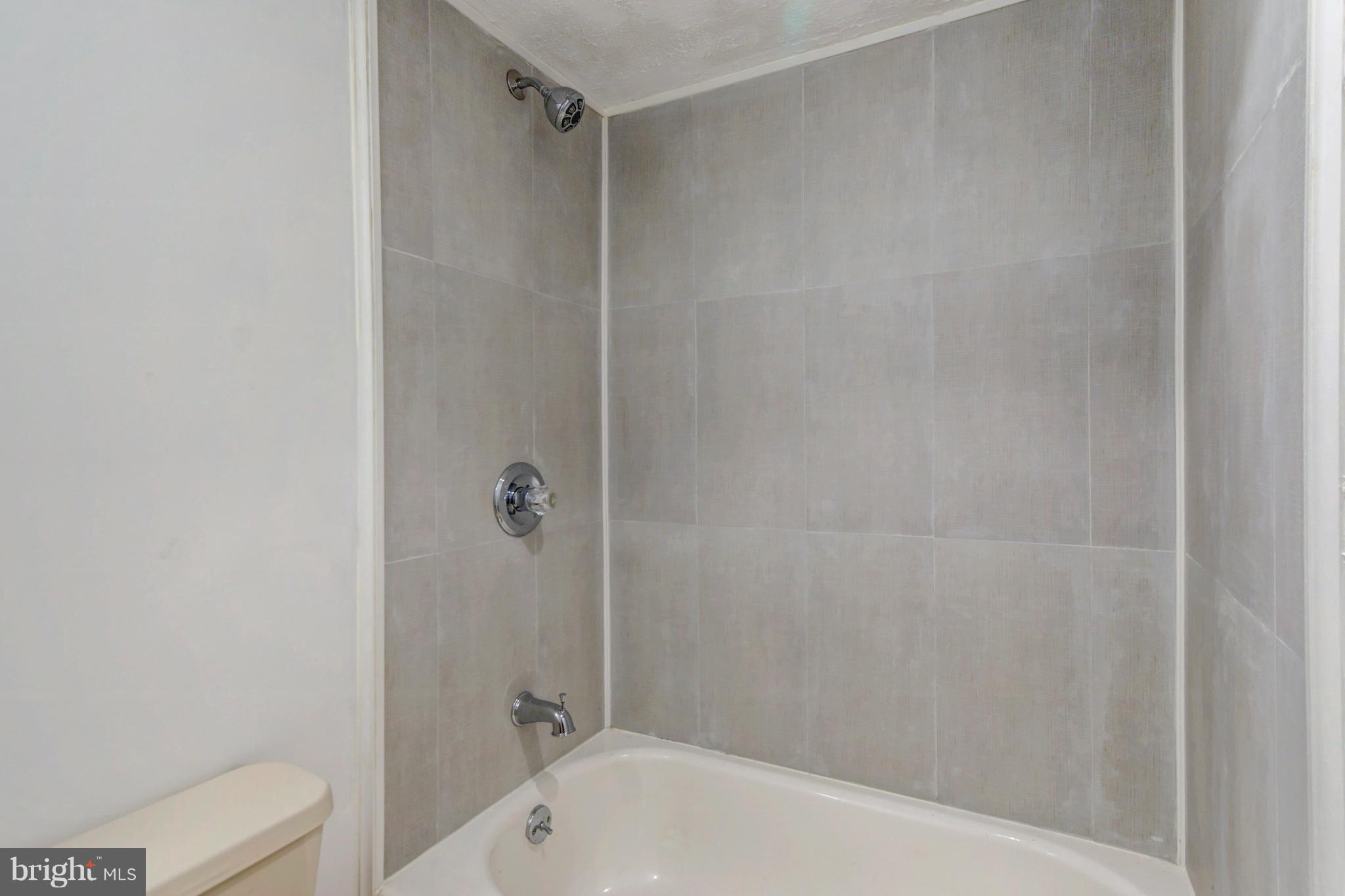 7105 Chamberlain Road Windsor Mill, MD 21244 - Photo 34 of 38 HALL BATH - FULL BATH ... Upgraded Tile