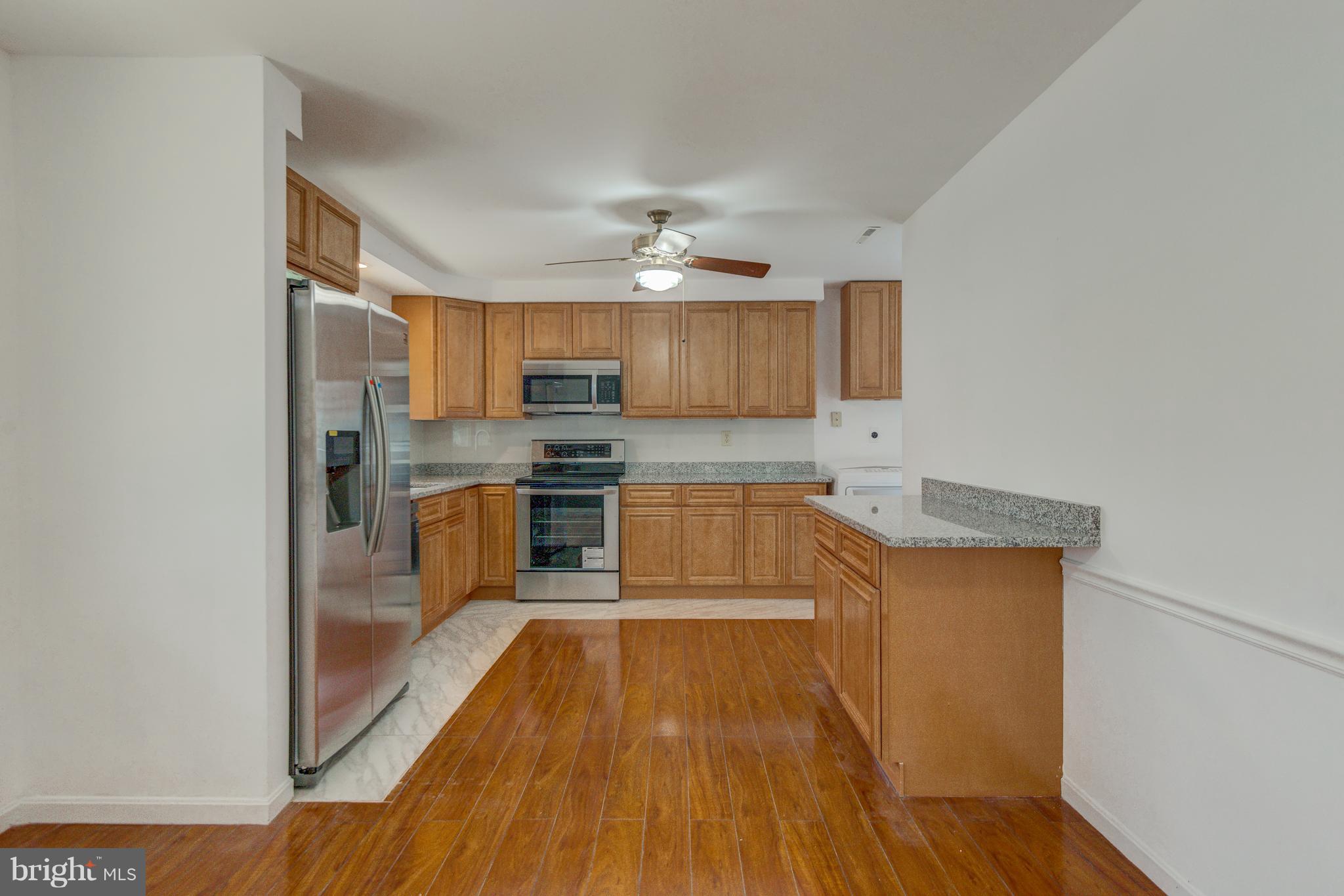 7105 Chamberlain Road Windsor Mill, MD 21244 - Photo 8 of 38 HUGE KITCHEN