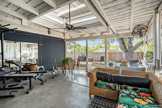 a outdoor space with lots of tables and chairs